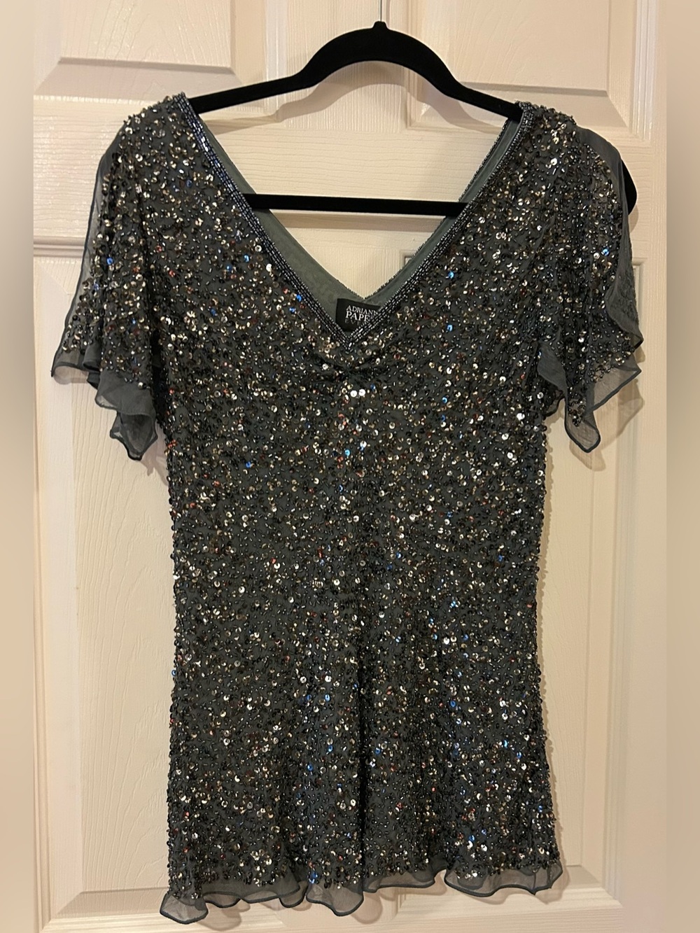 Adrianna Papell Evening Silk Charcoal
Beaded V-Neck top -
